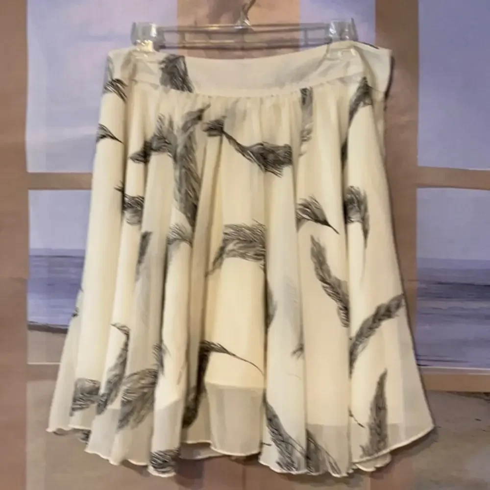 For Cynthia Ivory Feather Print Chiffon Pleated Mini Skirt